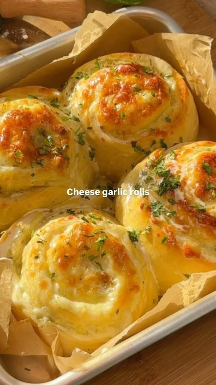 Buttery cheese garlic rolls fresh out of the oven, golden and delicious.